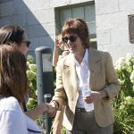 Principal Heather Munroe-Blum greets students outside of James Admin. (Alexandra Allaire / McGill Tribune)