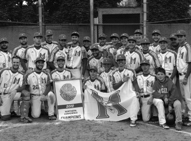 The Redmen celebrate their Northern Conference title. (Benjamin Gordon / McGill Tribune)