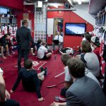 The Redmen study film before their final preseason game. (Simon Poitrimolt / McGill Tribune)