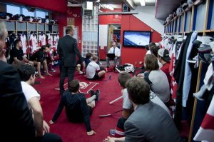 The Redmen study film before their final preseason game. (Simon Poitrimolt / McGill Tribune)