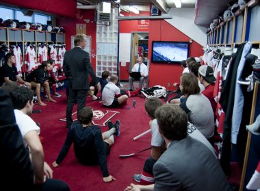 The Redmen study film before their final preseason game. (Simon Poitrimolt / McGill Tribune)