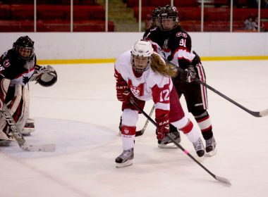 Fourth-year forward Chelsey Saunders fights for position in front of the net. (Michael Paolucci / McGill Tribune)