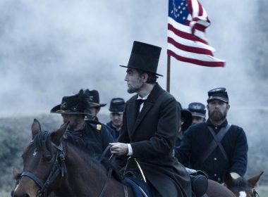 Lincoln (Daniel Day-Lewis) surveys the ravages of war. (filmofilia.com)