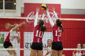 Plante and Hébert rise for the block against Memorial. (Simon Poitrimolt / McGill Tribune)