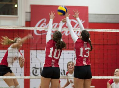 Plante and Hébert rise for the block against Memorial. (Simon Poitrimolt / McGill Tribune)