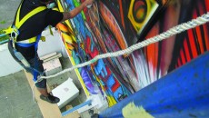 Artist Hell-P painting a mural in Longueil (hellp-art.com)