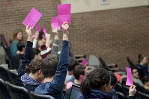 Students vote at the GA. (Simon Poitrimolt / McGill Tribune)