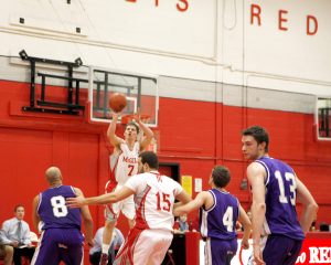 Christian McCue spots up for the jumper. (Liam Maclure / McGill Tribune)