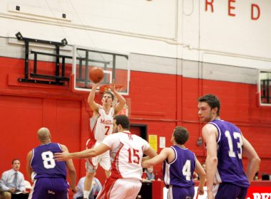 Christian McCue spots up for the jumper. (Liam Maclure / McGill Tribune)