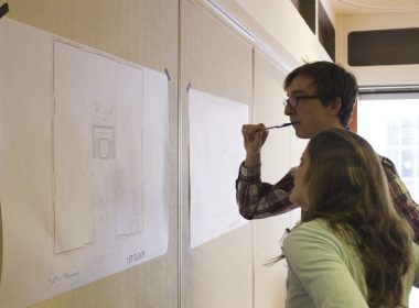 Students draw their ideas for new student space on SSMU building floor plans. (Remi Lu / McGill Tirbune)