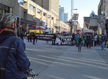 Demonstrators rallying in solidarity with victims of police brutality