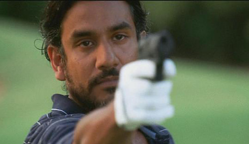 sayid points a gun to the viewer