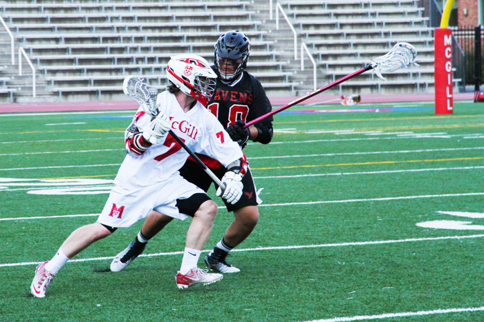 Jake Gutman of McGill Redmen lacrosse makes a play