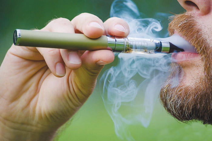 beard man smoking e-cigarette