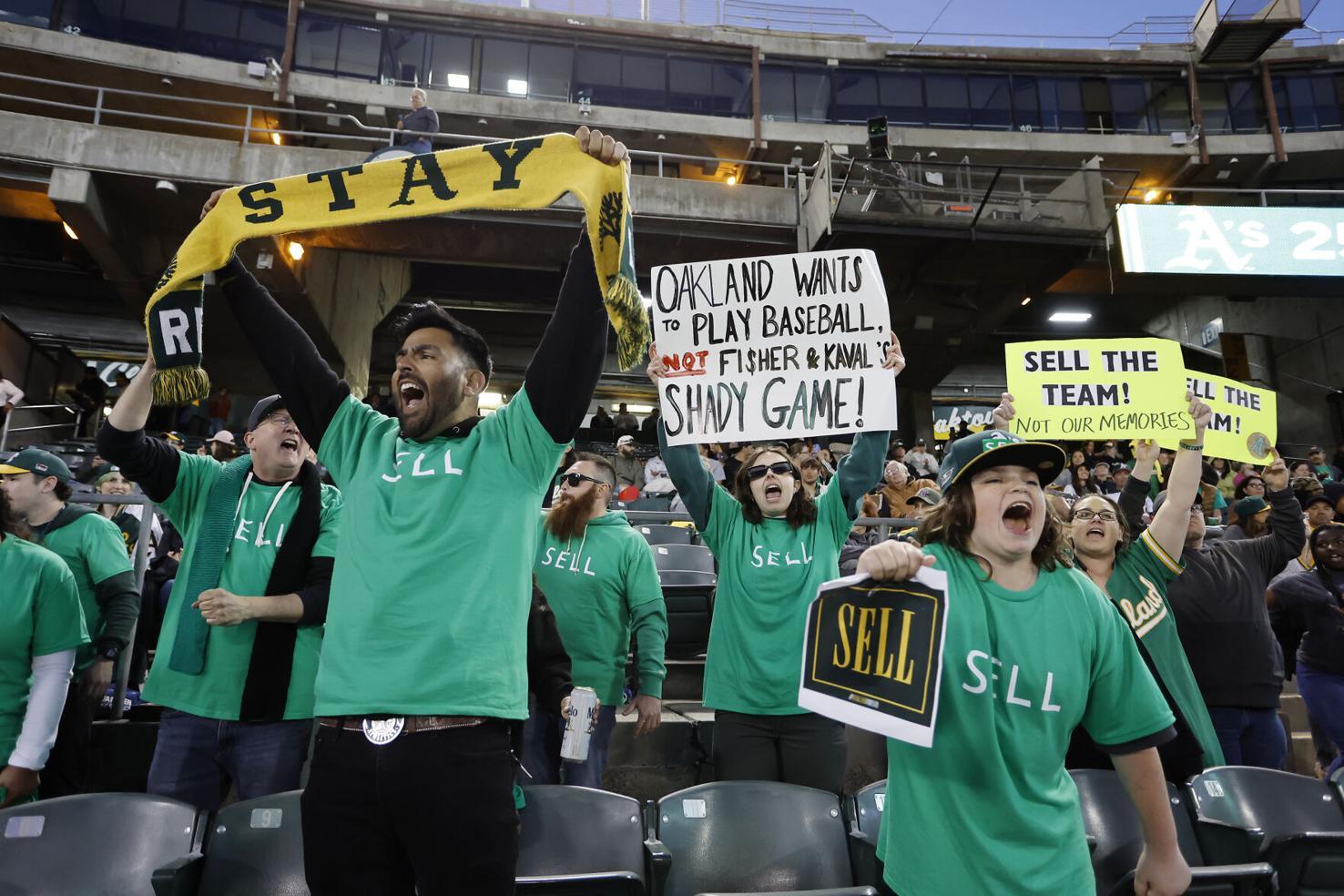 Pirates owner Bob Nutting took a picture with a fan wearing a 'Sell the  Team' shirt in protest.